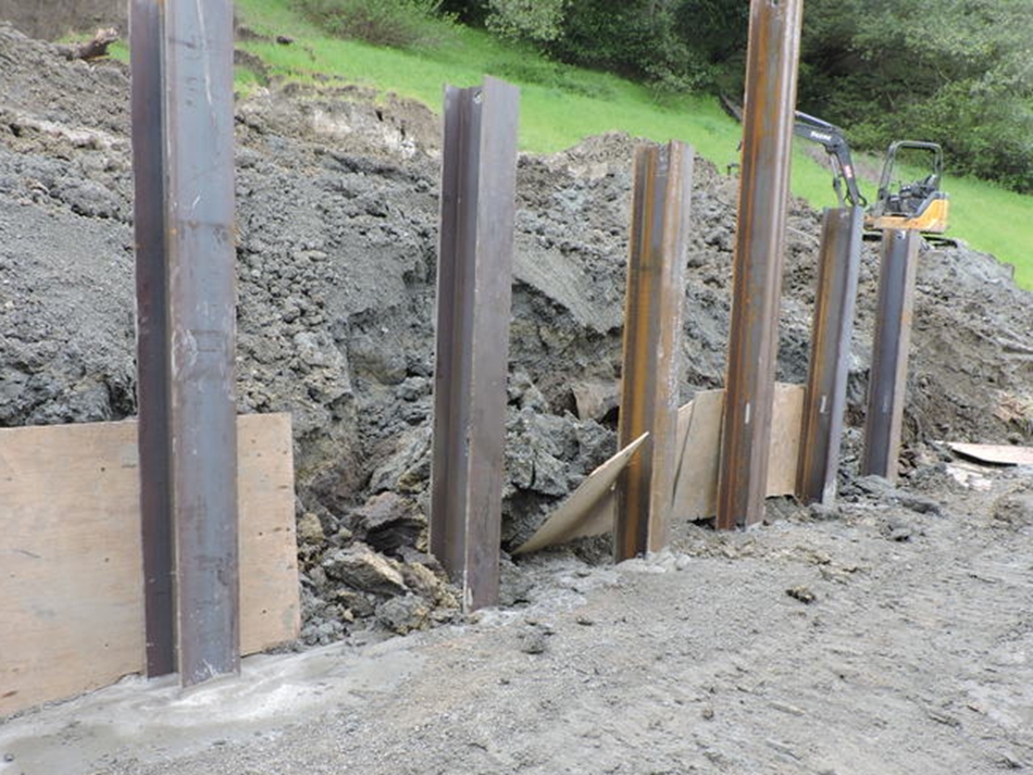 Steel I-beams installed and backfilled